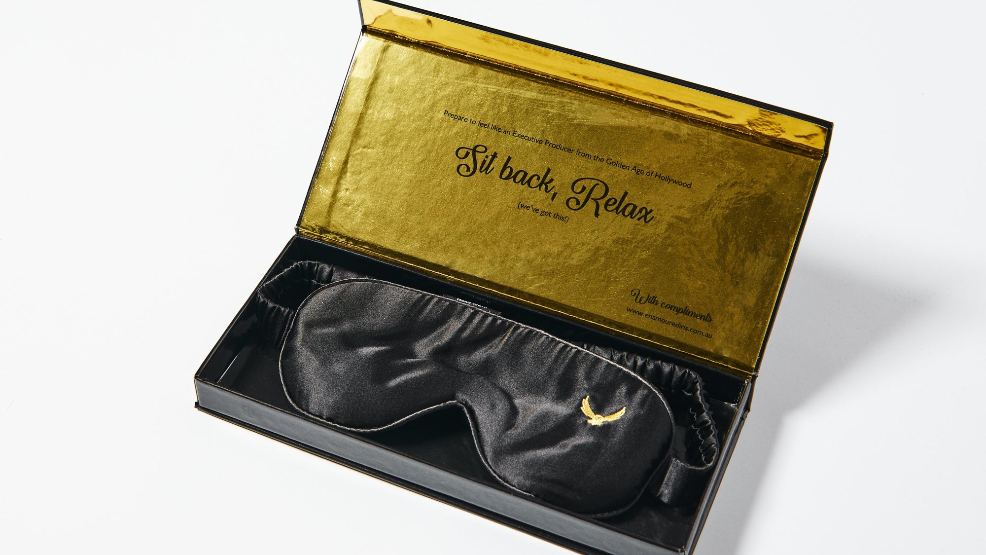 Enamoured Iris's luxurious silk eye mask in a gold box with custom engraving