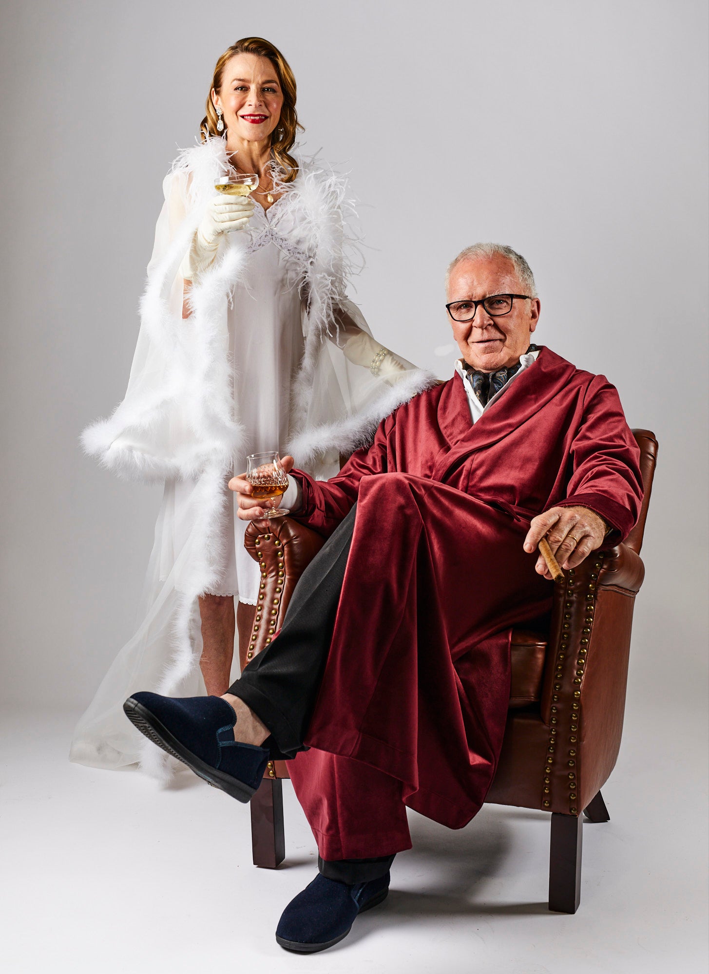 Woman wearing a White Silk Robe and man wearing a Red Silk Robe from Melbourne video production company Enamoured Iris
